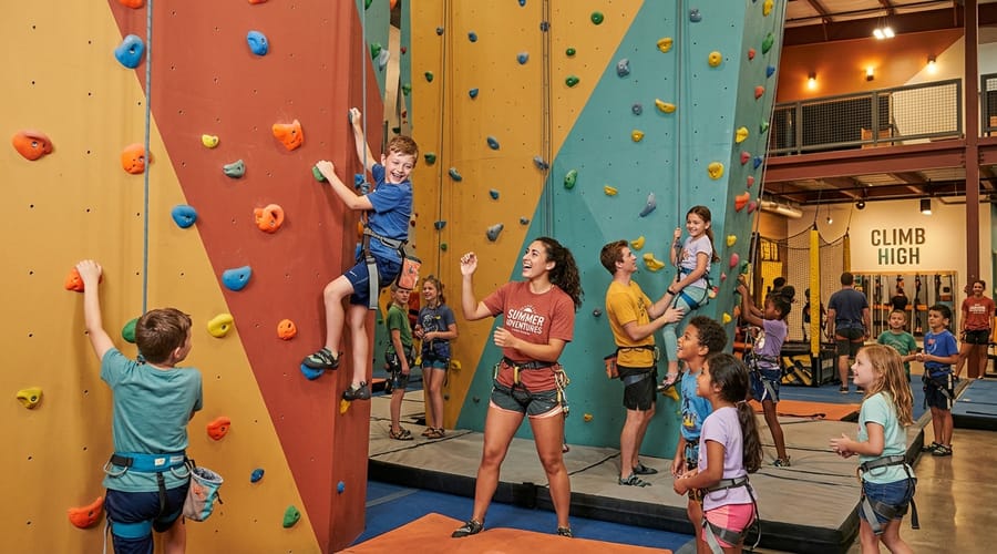 The APEX Crew — enthusiastic counselors with kids