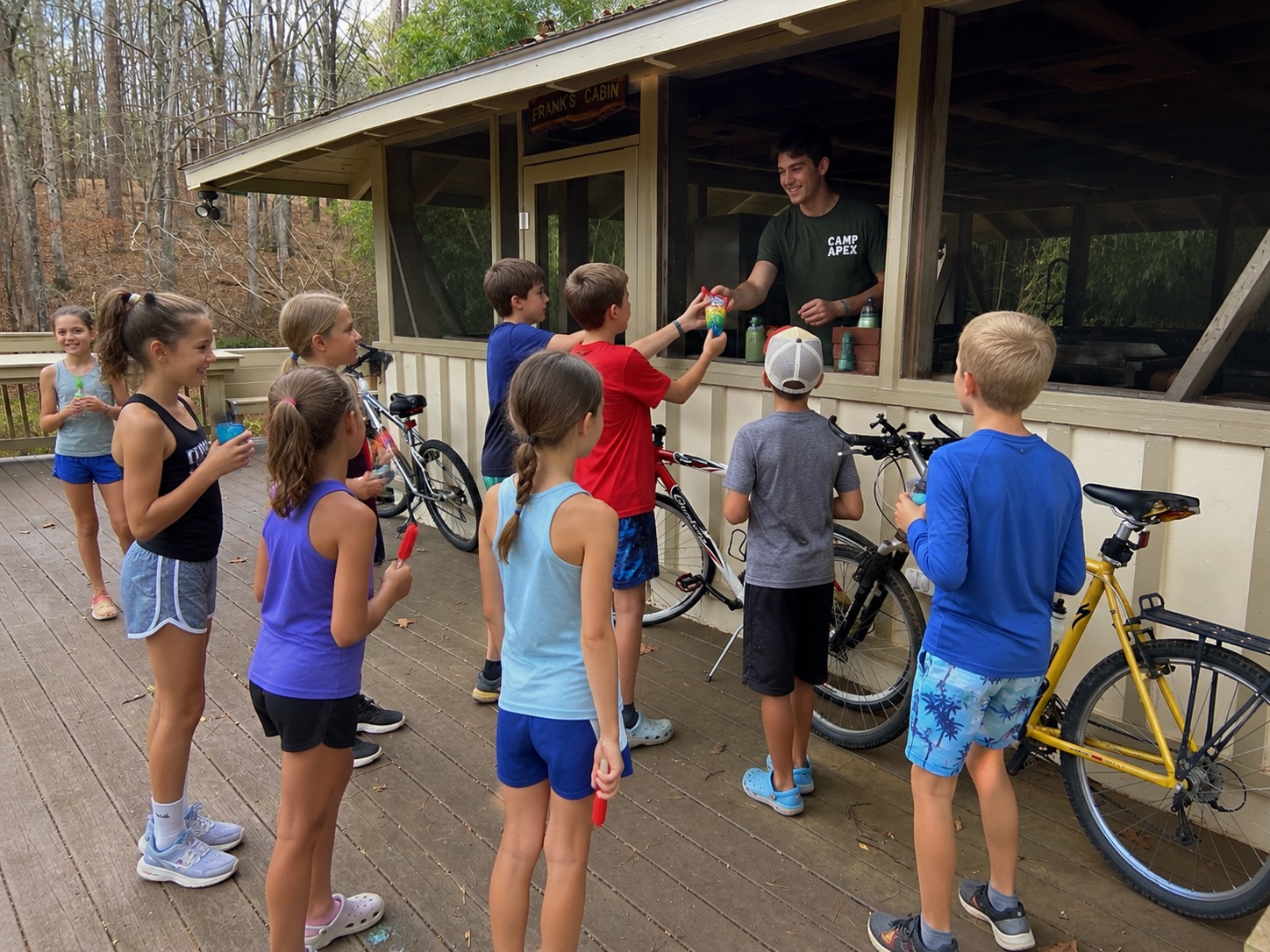 Kids getting snacks at the Camp APEX Snack Shack