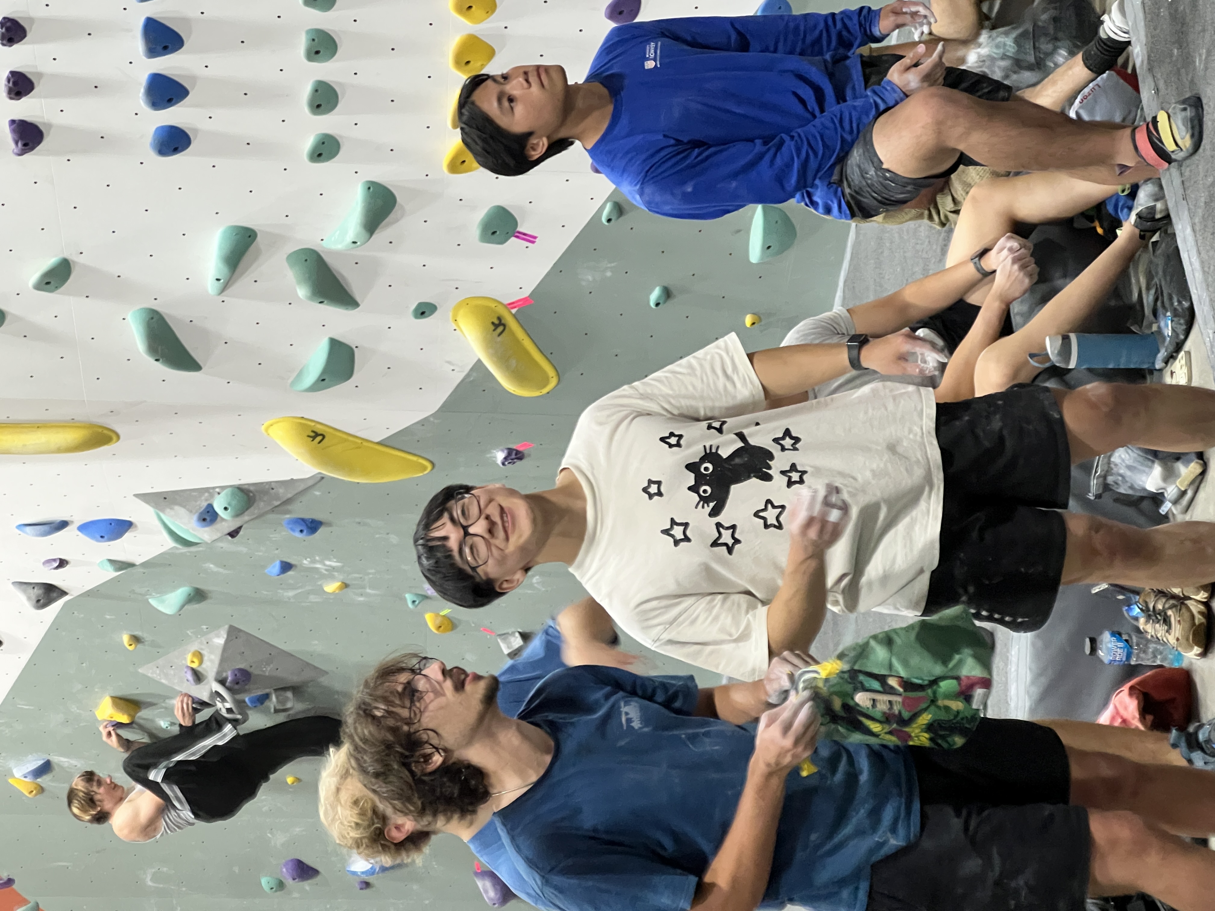 A group of students hanging out on the crash pads at the APEX Student Welcome Back Party
