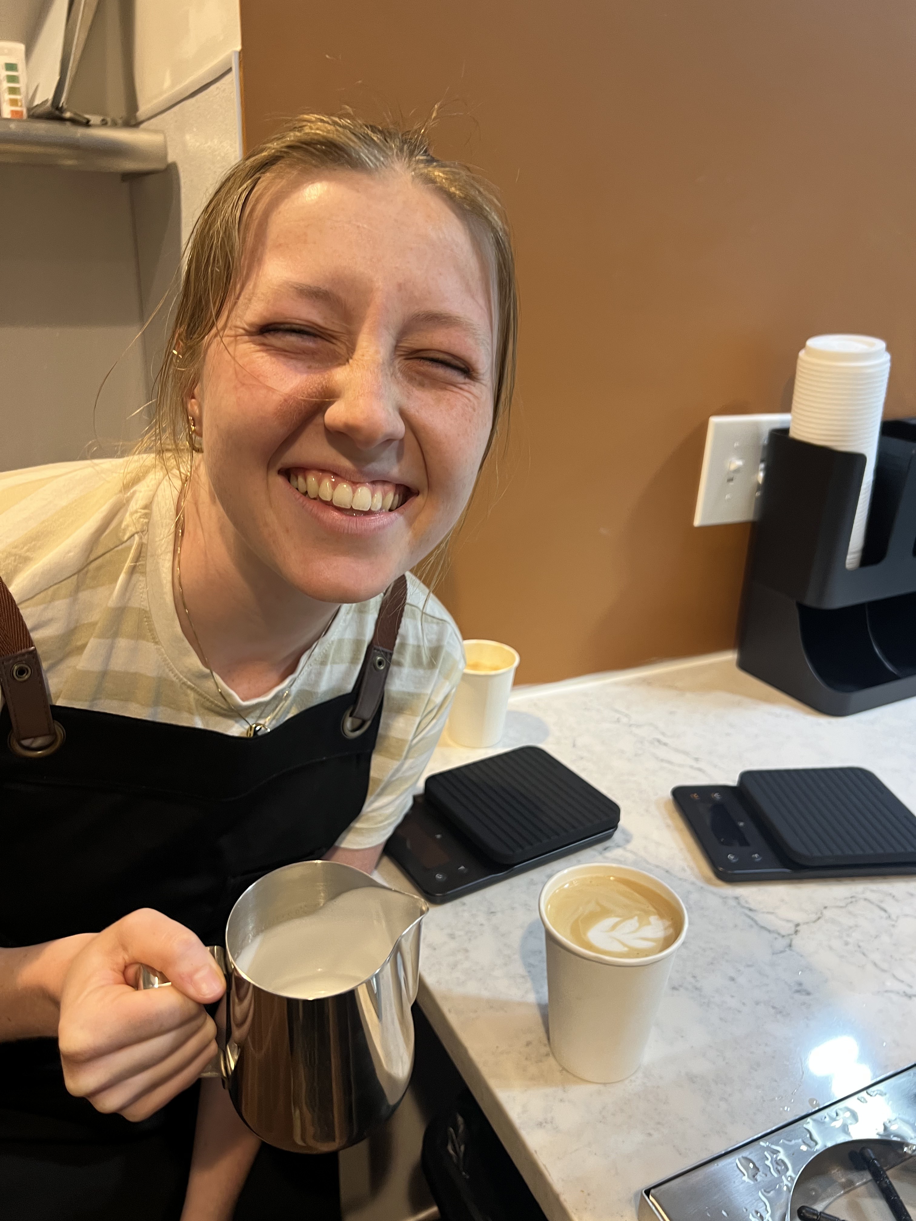 APEX café baristas celebrating at the Grand Opening